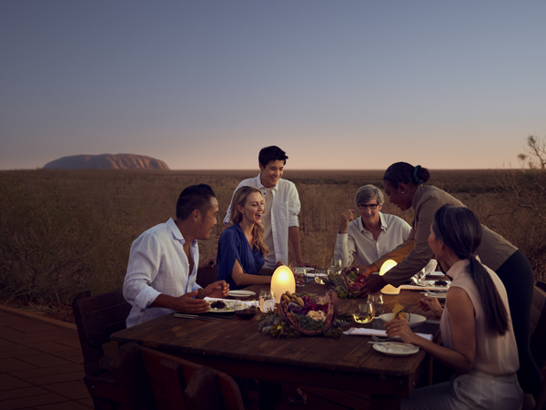A table of people dining at Tali Wiṟu in Uluṟu