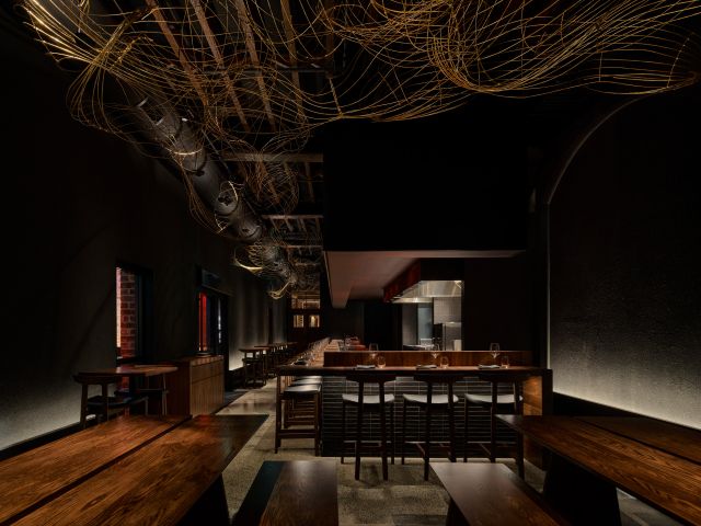 the moody dining interior at Ibushi