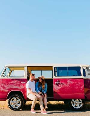 Couple parked by a canola field near Wagga Wagga
