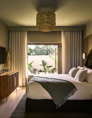 A green coloured room at Swell Hotel Byron Bay