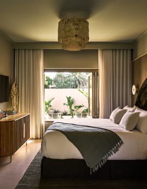 A green coloured room at Swell Hotel Byron Bay