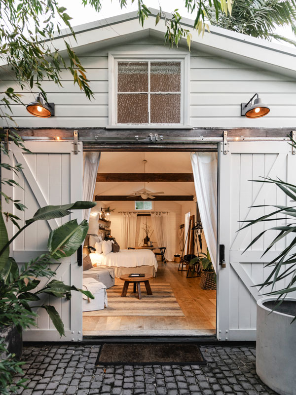 the white-washed cottage at The Bower Byron Bay