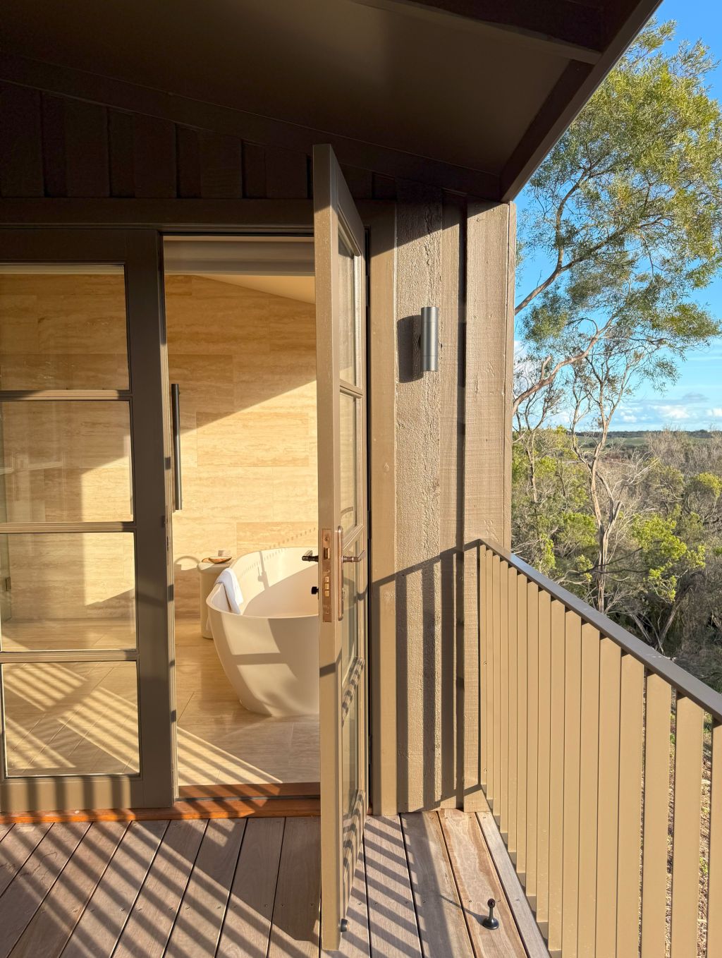 The sanctuary Villa bathroom and deck