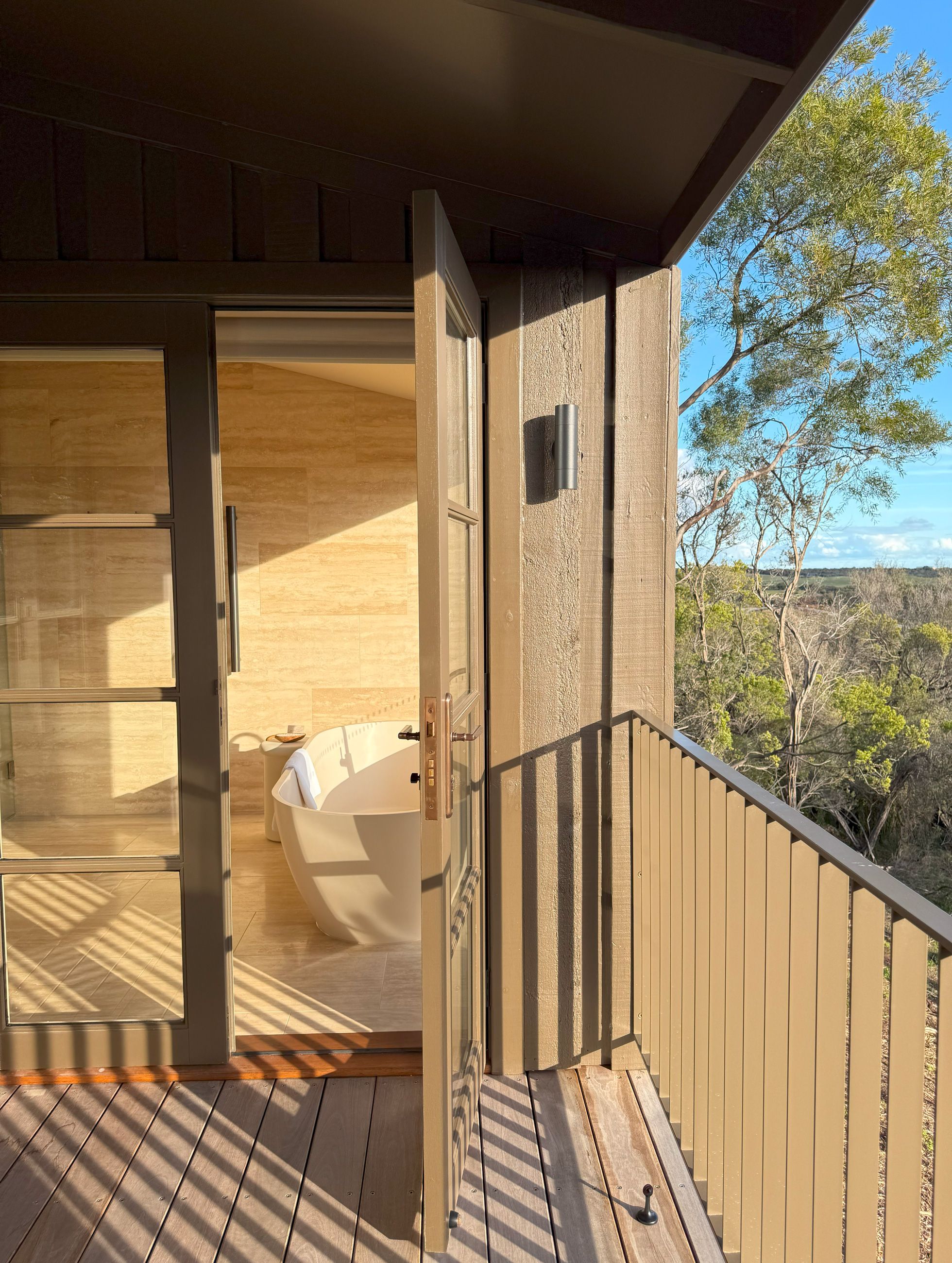 The sanctuary Villa bathroom and deck