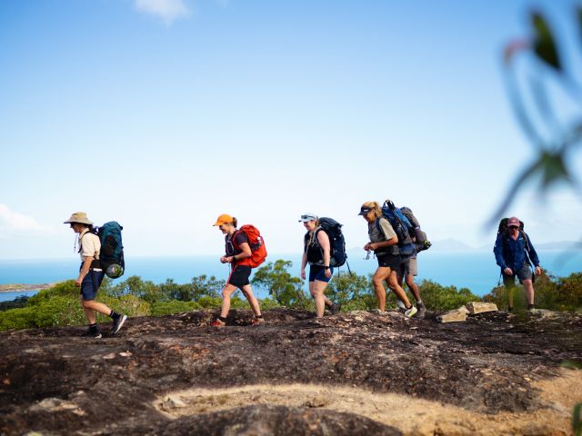 A hiking group on The Ngaro Track, Whitsunday Islands
