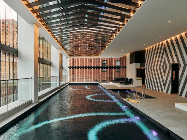 the outdoor heated lap pool at Mövenpick Hotel Melbourne On Spencer