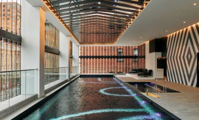 the outdoor heated lap pool at Mövenpick Hotel Melbourne On Spencer