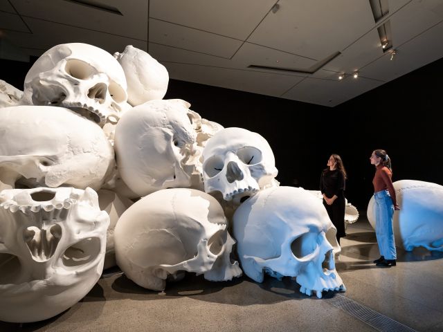two women looking at an exhibition in the national gallery of victoria