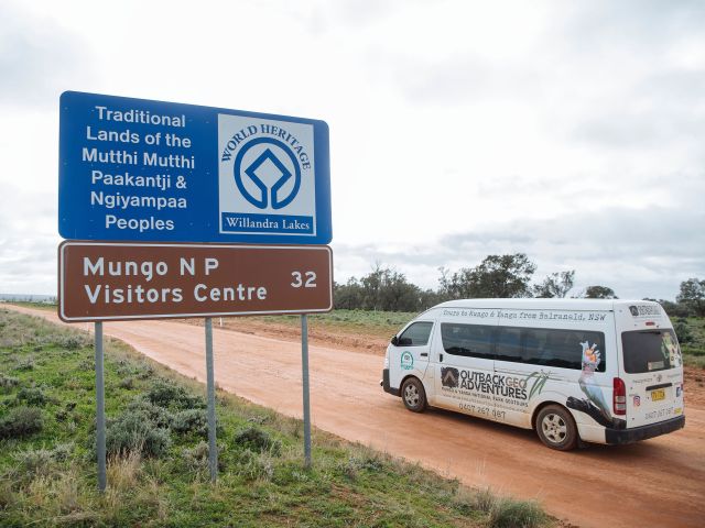 Outback Geo Adventures mungo sunset tours van driving on the road