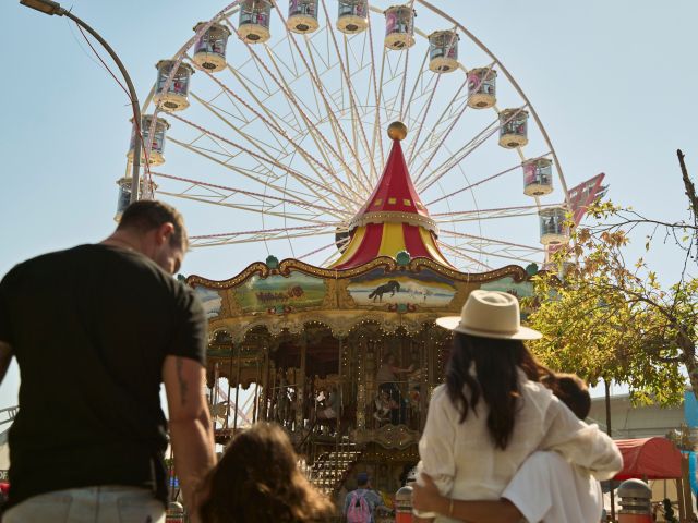 A family enjoys the sights and sounds of the Sydney Royal Easter Show