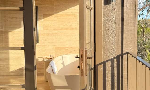 The Sanctuary Villa view of the bathroom and deck