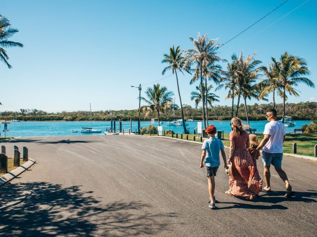 a family heading to Gladstone Marina in the East Shores precinct