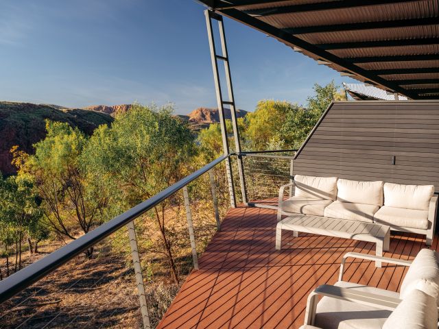 the balcony Deluxe Lakeview cabin at Discovery Resorts - Lake Argyle