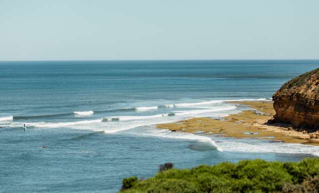 surfers out at Bells Beach