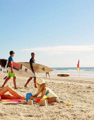 A family on the beach in the Gold Coast