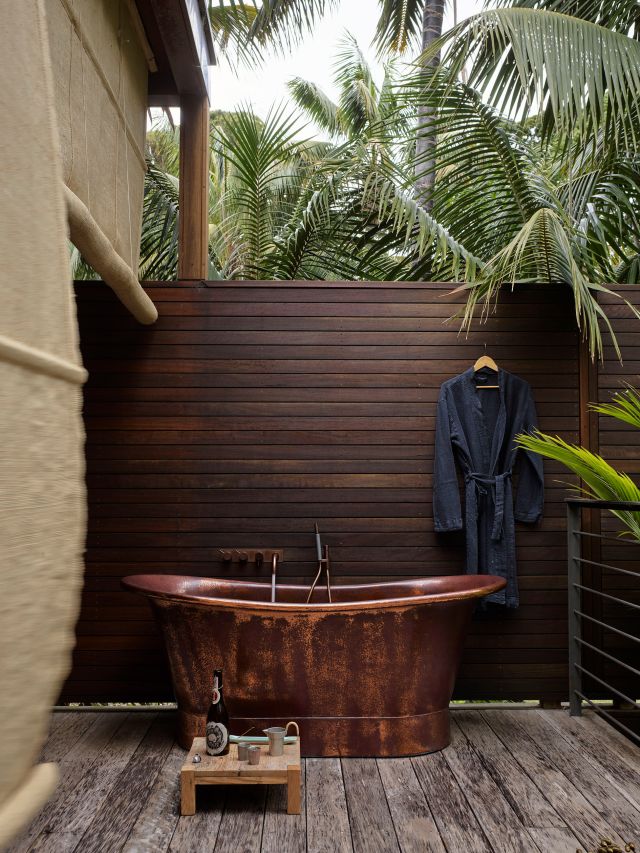 an outdoor copper tub at Island House