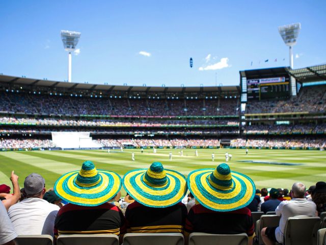spectators watching Melbourne Cricket Ground