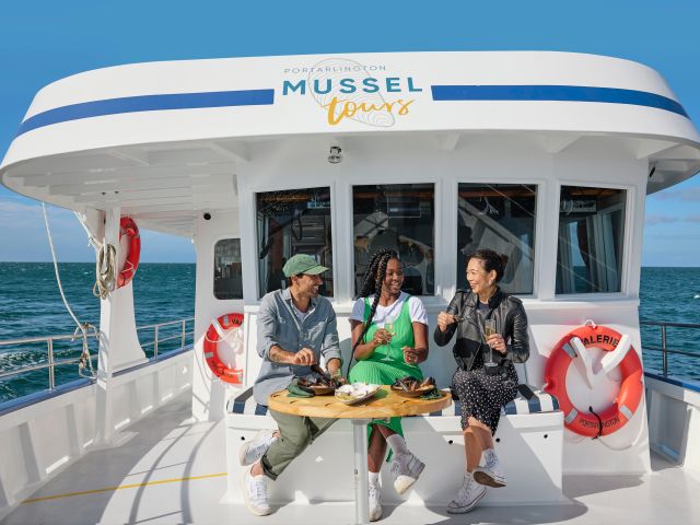 guests sampling Portarlington mussels onboard