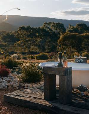 outdoor bathtub at Nook On The Hill, destinations that help you slow down