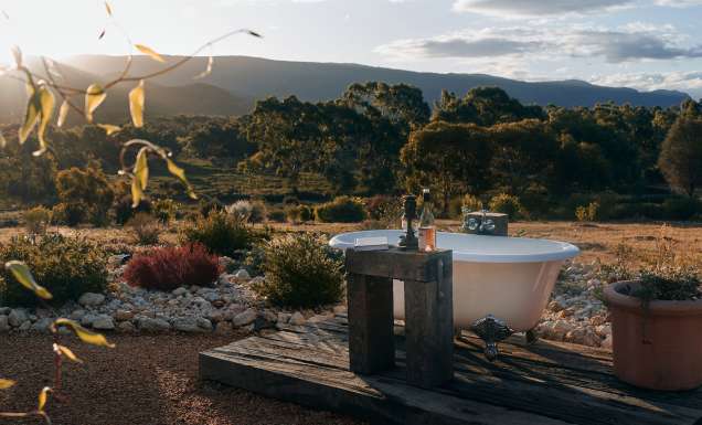 outdoor bathtub at Nook On The Hill, destinations that help you slow down