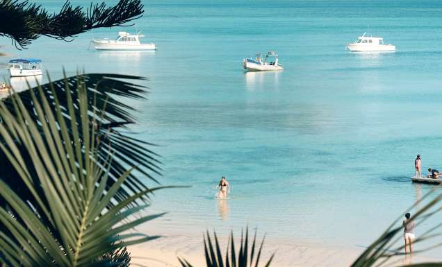 Swimmers on the beach at Lord Howe Island