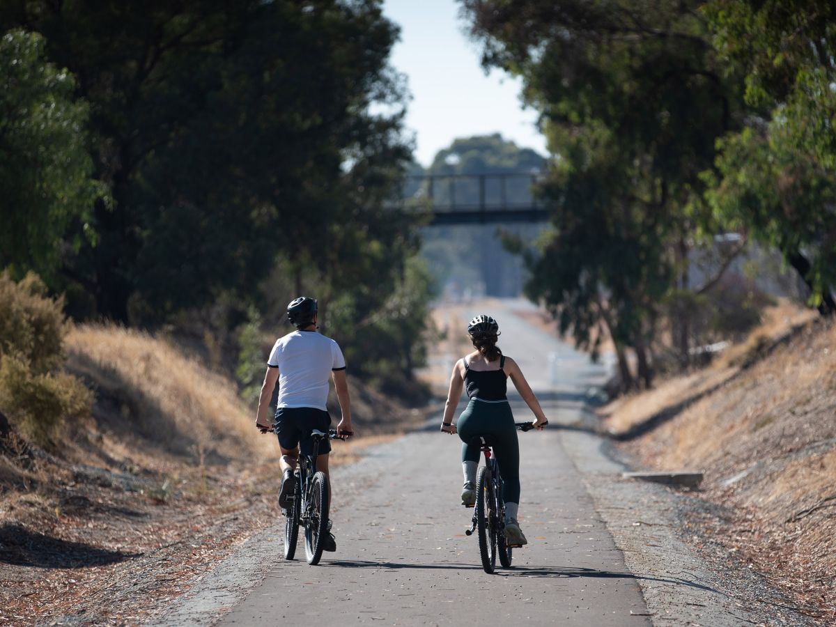 two bikers riding on the 19-kilometre Waranga Rail Trail