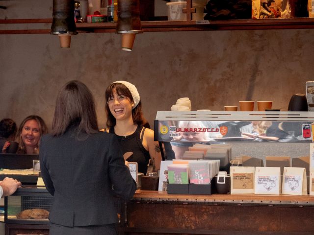 single o surry hills barista serving customer