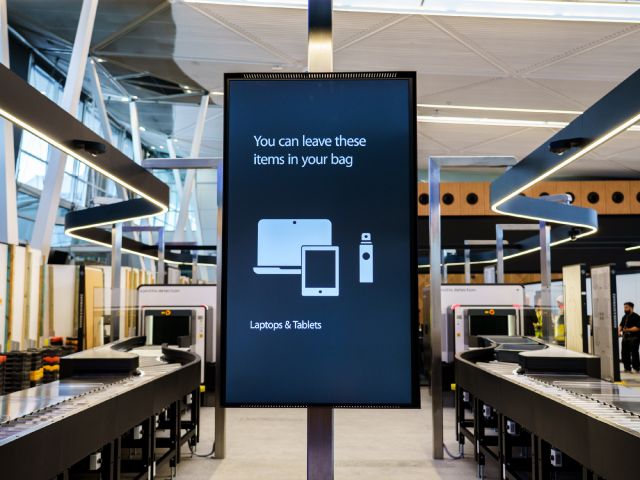 Sydney Airport security screening signs