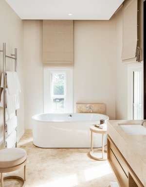 A neutral-toned bathroom at COMO the Treasury in Perth