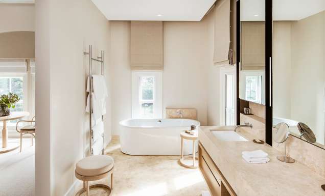 A neutral-toned bathroom at COMO the Treasury in Perth