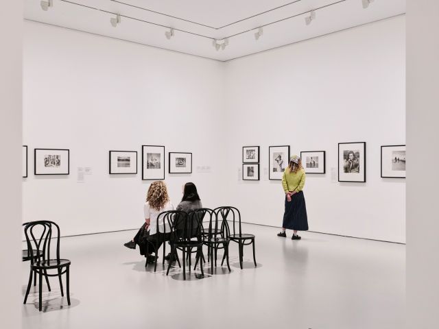 Visitors in the Women Photographers 1900–1975: A Legacy of Light exhibition, on display from 28 November to 3 May 2026 at NGV International. (Image: Eve Wilson)