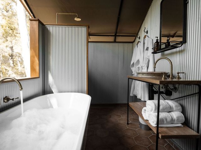 a private tub with bush views at Paperbark Camp, Woollamia