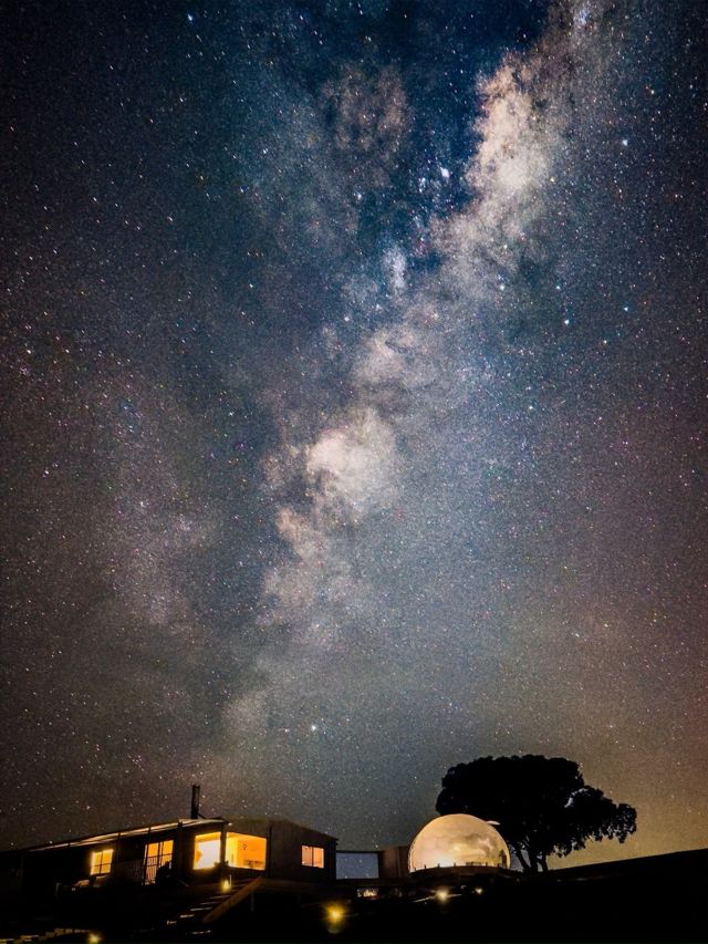 Astra cabin at night with the Milky Way