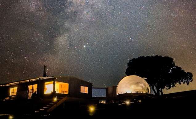 Astra cabin at night with the Milky Way