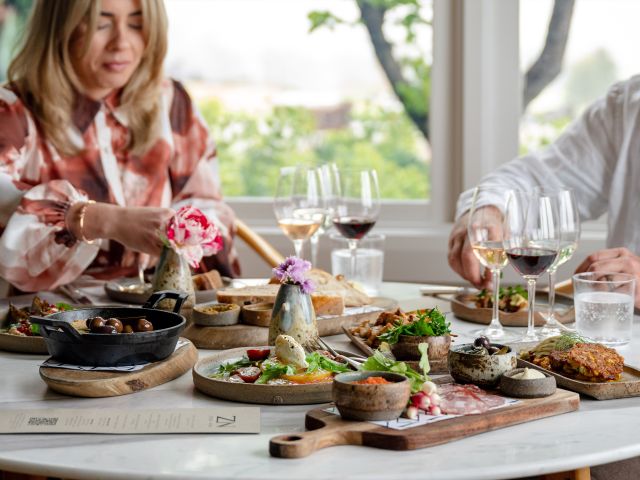 A couple grazing on share plates