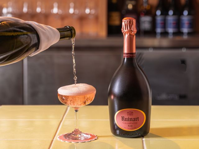 pouring sparkling rosé into a glass at Terrigal Pavilion
