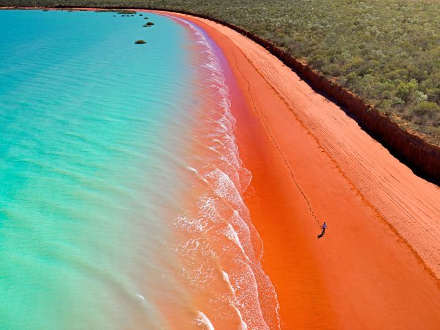 Azure water meets red sand at Roebuck Bay, Broome.