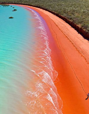 Azure water and red sand at Roebuck Bay, Broome.