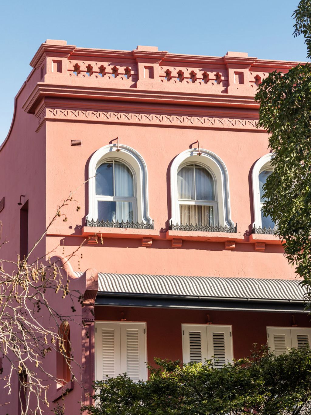 The pink facade of Medusa Hotel