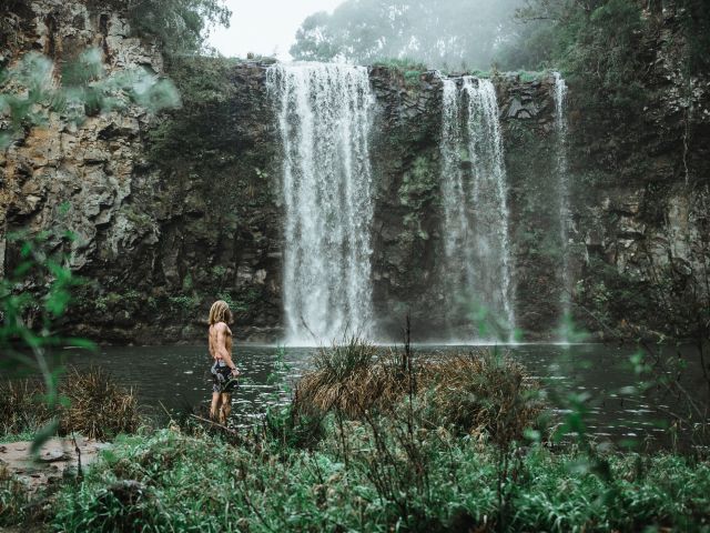 A man standing at Dangar Falls, Dorrigo National Park, NSW