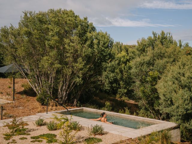 Woman in bath at Alba Thermal Springs and Spa