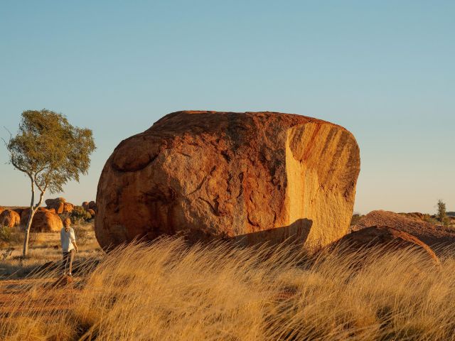 pson looking at Karlu Karlu (Devils Marbles) northern territory