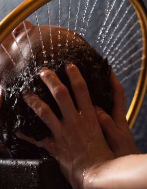 A woman getting a Japanese head spa treatment