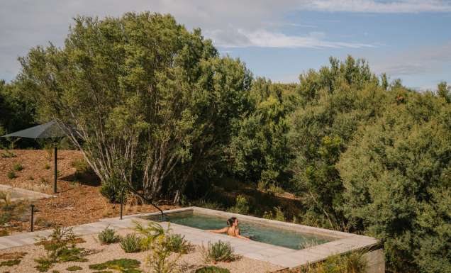 Woman in bath at Alba Thermal Springs and Spa