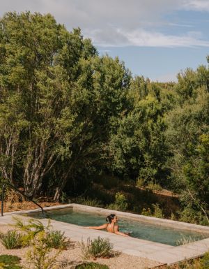 Woman in bath at Alba Thermal Springs and Spa