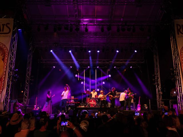 band on stage at Riverboats Music Festival