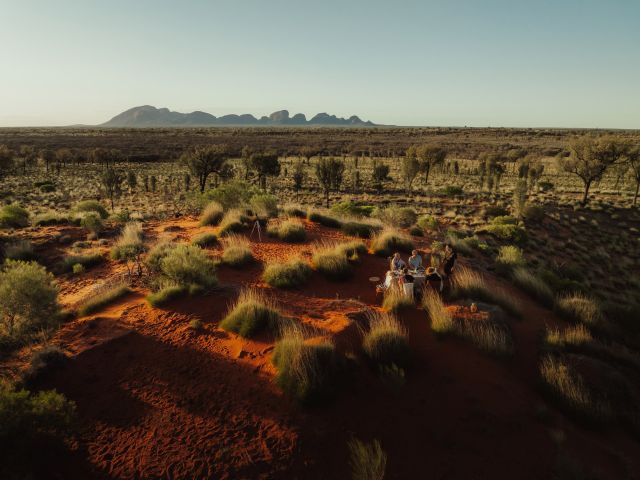 Aerial shot of Uluṟu-Kata Tjuṯa Signature Walk sunset dining under the stars