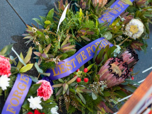 Anzac Day memorial with flowers