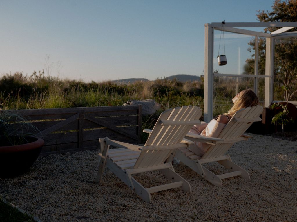 a woman relaxing at Dunalley Bay Sauna
