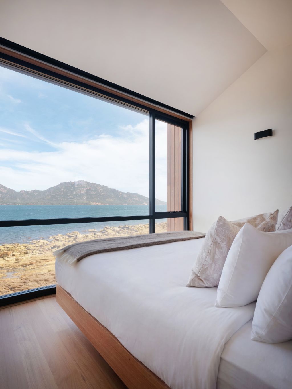 Bed looking out to island at Picnic Island in Tasmania
